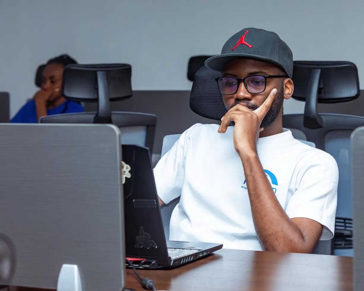 Figure Academy learner smiling in class